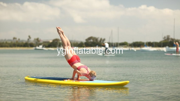 Yoga on the inflatable paddle board